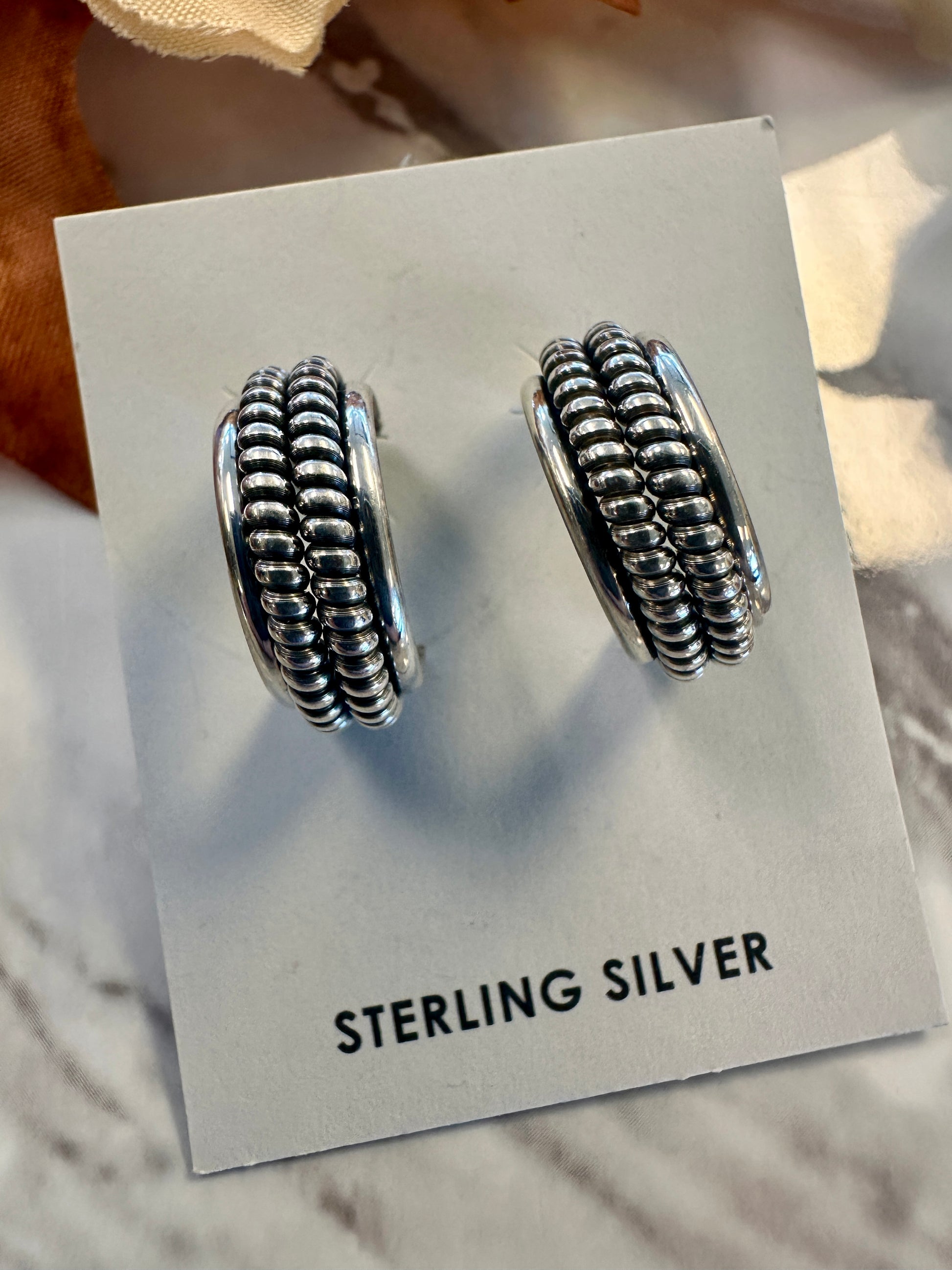 Sterling Silver Hoop Earrings by Caroline Isosie