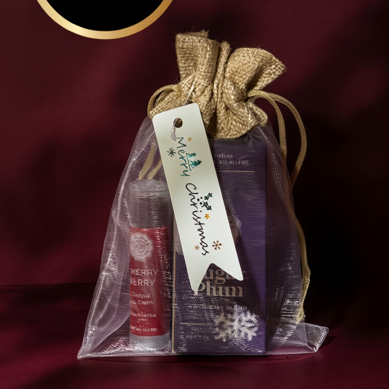 Gift bag with a product and a tag on a maroon background