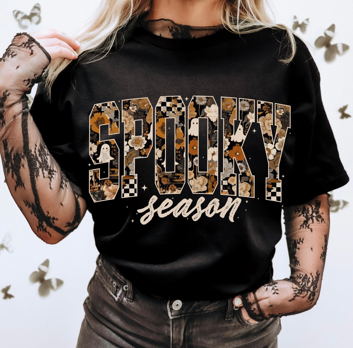 Halloween Spooky Season Graphic Tee printed on a Black Bella Canvas Tee