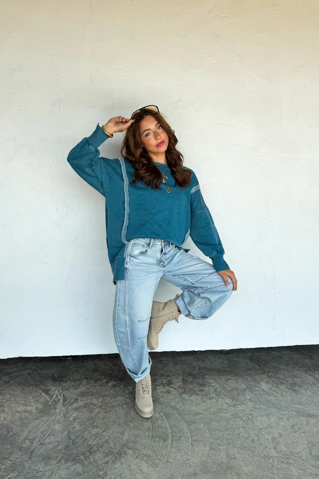 We spared no attention to detail in our new mineral washed sweatshirt! This forever timeless pullover is a slouchy, relaxed fit with exposed seaming, cute split cuff hem and ribbed trim detail! Has super soft "sweatshirt" feel on the inside!
