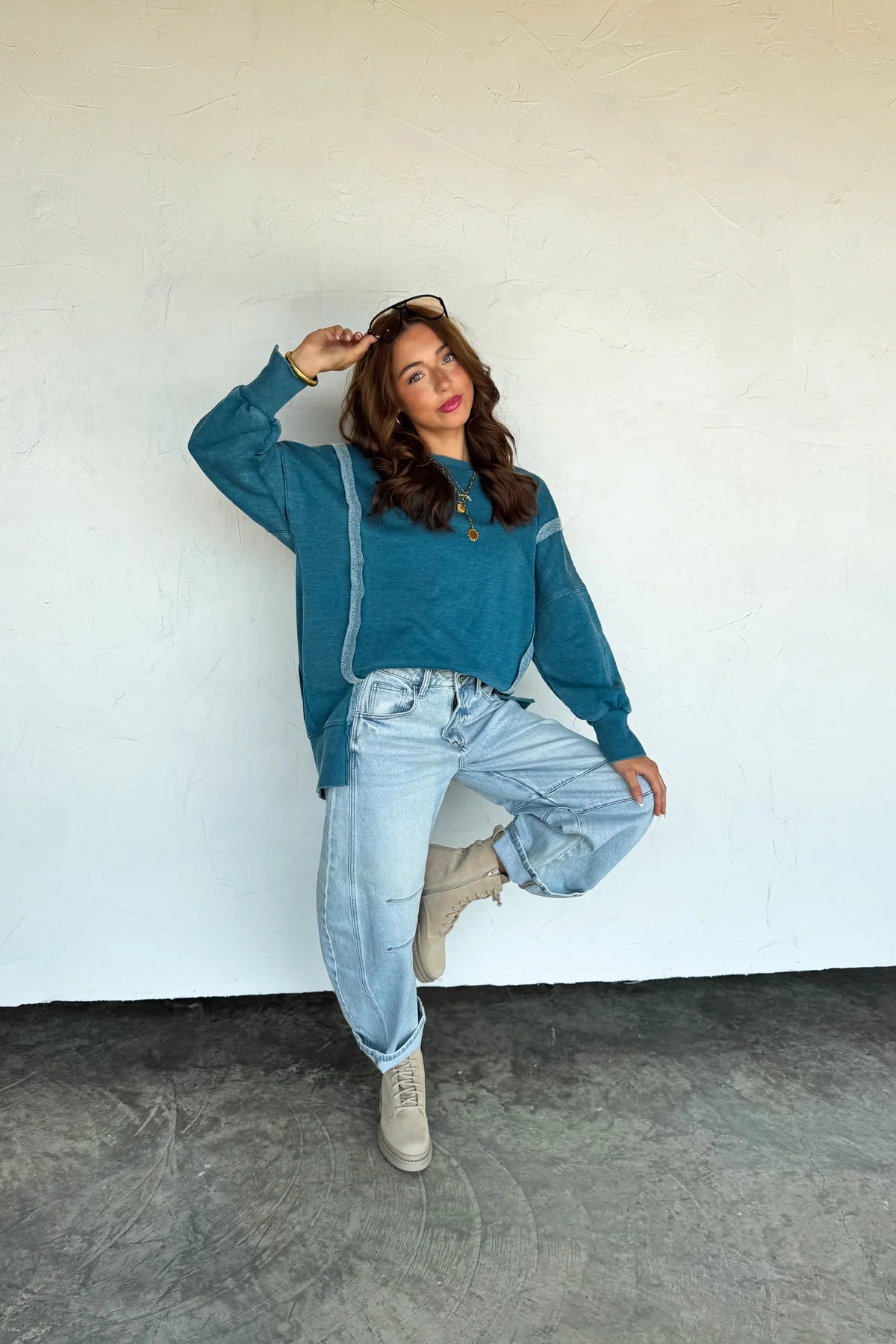 We spared no attention to detail in our new mineral washed sweatshirt! This forever timeless pullover is a slouchy, relaxed fit with exposed seaming, cute split cuff hem and ribbed trim detail! Has super soft "sweatshirt" feel on the inside!
