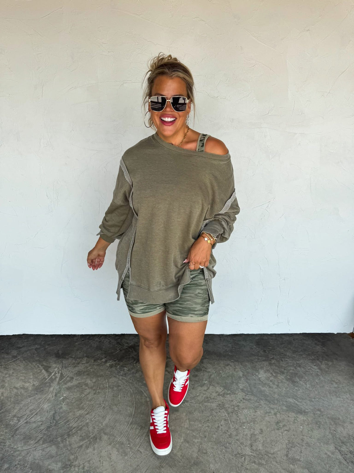 Light weight pullover, that can be worn off the shoulder available in small to xlarge