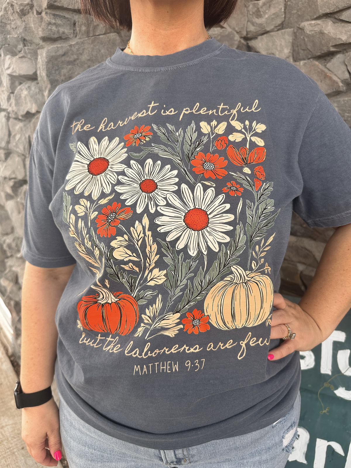 Fall t-shirt on a denim comfort colors tee with daisies and pumpkins